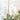 Modern wallpaper features lush green leaves, white blooms, and pink-tinted trees with dragonflies, butterfly, and a perched songbird.