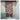 Embroidered Maroon wallpaper mural featuring two peacocks perched on a flowering tree branch, with subtle gray walls and rocks below.
