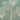 Cream and copper botanical outlines resembling dandelion seeds scatter across a muted teal wallpaper, adding airy elegance to the wall.