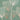 Airy white and blush pink dandelion-inspired flowers with slender stems scatter across a textured teal wallpaper, creating a serene, modern mood.