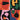 Modern wallpaper design featuring four organic black shapes over vibrant orange, pink, green, yellow, red, and blue quadrants.