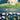 Wallpaper design featuring blooming pink lotus flowers across a tranquil pond, with a cow and calf walking on the grassy bank above.