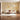Floral mural wallpaper adds elegance to a modern living room with cream sofa, wooden floor, round coffee table and soft ambient lighting.