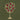 Stylized tree with golden branches and nine red pomegranates, two birds perched; dark green, textured background adds depth.