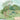 Wallpaper design with green palms and leafy trees, vibrant peacocks, grazing white cows, and a white bird over a pond under blue sky.