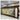 Pastoral wallpaper mural with people, cows, trees, and a river framed by wood panels on an indoor wall below an air conditioner.
