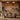 Dining room wall mural depicting sunlit mountains and trees in warm earthy tones, paired with a wooden table and neutral chairs.