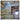 Playroom wall mural features vibrant cabinets painted with cows, windmill, and tractor scenes; shelves above hold an assortment of toys.