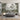 Jungle-themed wall mural with vivid tropical plants and animals is the focal point above a large bed in a modern, light-filled bedroom.
