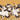 Graceful cranes with white, gray, and black markings dance on a luminous gold background, creating an artful Japanese mural pattern.
