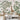 Playful animal wall mural with giraffe, tiger, lemurs, and birds in lush green trees behind a bed with soft cushions and an octopus toy.