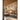 Oversized beige floral silhouettes create a mural on a neutral wall within a sunlit modern lounge featuring wooden slatted ceilings and furniture.