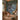 Magical forest treehouse wall mural in a child’s bedroom featuring soft, whimsical tones and woodland motifs behind a bed with starry canopy lights.