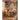 Whimsical mural wallpaper featuring a fairy-tale cottage, blooming wisteria, and pink gardens, styled in a room with a wooden desk.