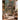 Sunlit playroom wall mural featuring a whimsical forest scene with a multi-story treehouse cabin, creating a cozy and imaginative atmosphere.