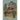 Whimsical forest treehouse wall mural featuring a glowing cozy interior, wooden deck, and a deer grazing along a rustic woodland path.