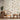 Cream wallpaper adorned with delicate birds, branches, flowers, and berries in a serene room with light wood furniture and soft lighting.